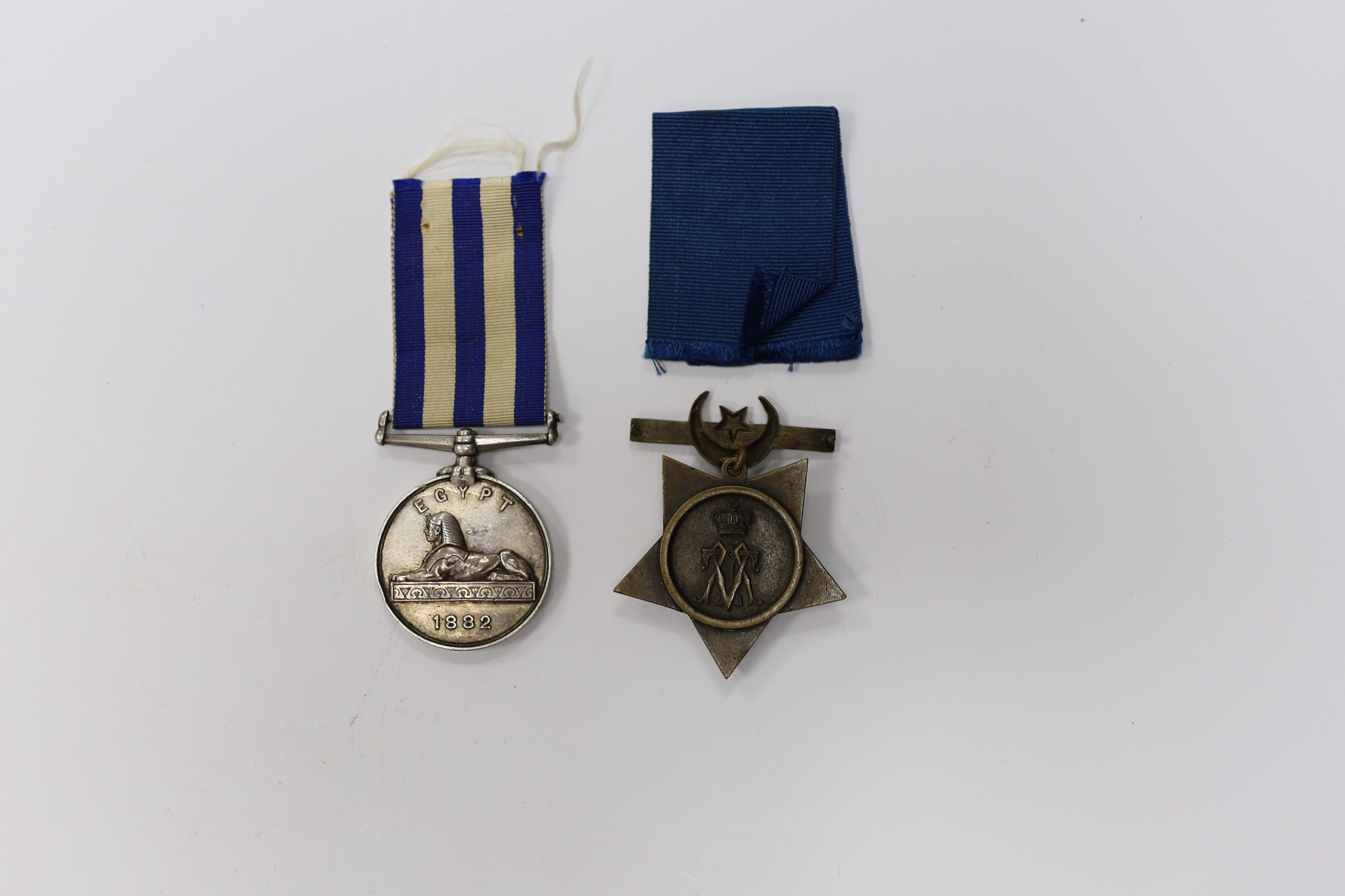 An Egypt Medal 1882-89 to 2636 Pte R.Hopwood. 2/Derby,R. and a Khedive's Star 1882.